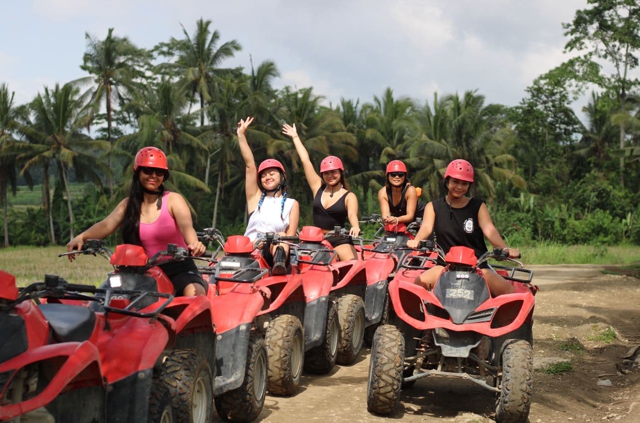 Friends on quad bikes in Bali