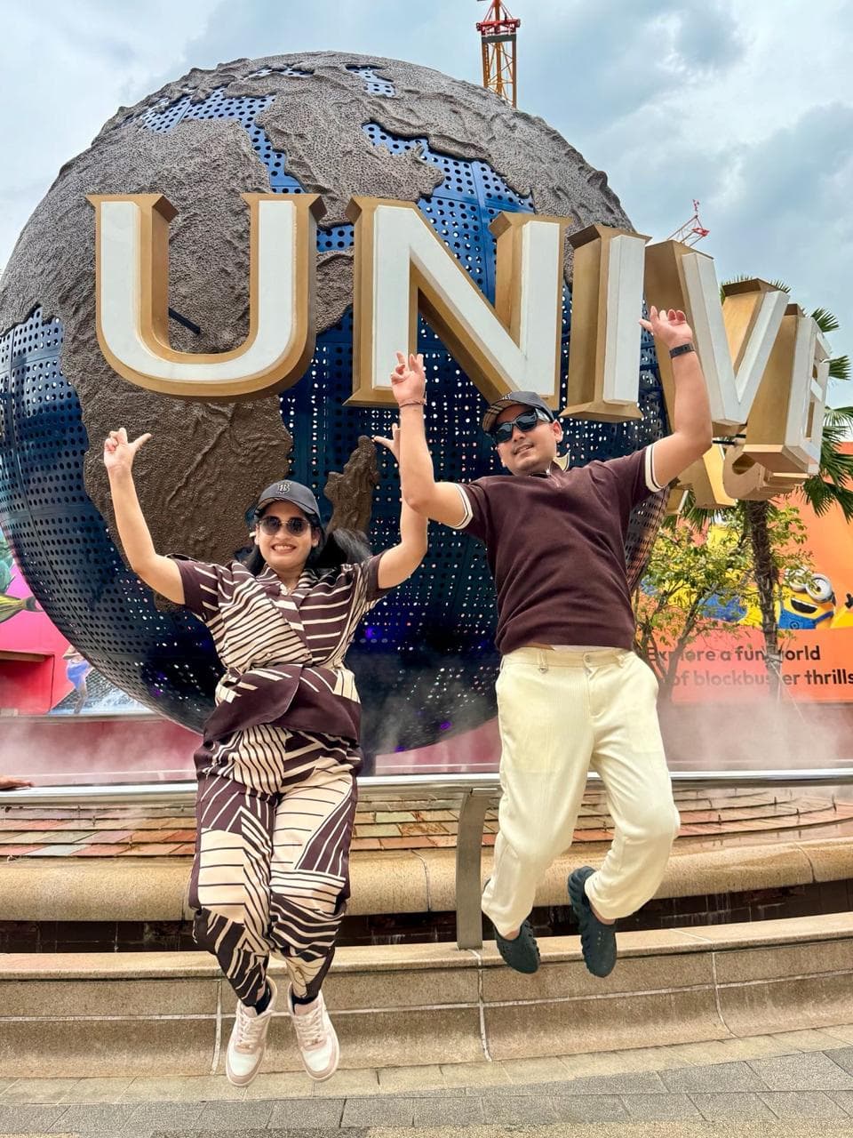 Jumping in front of the Universal Studios globe, Sentosa
