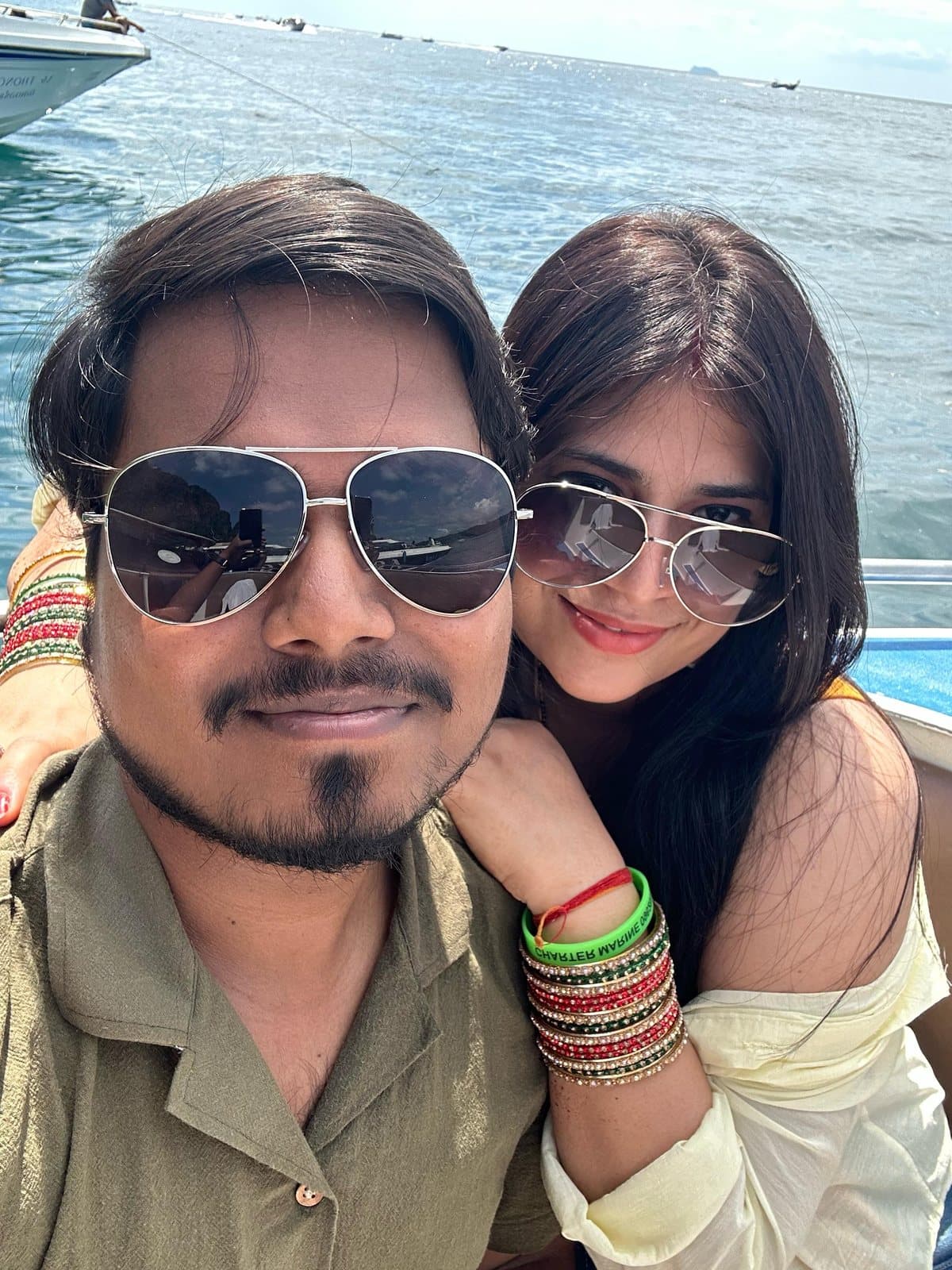A couple's selfie on a boat in Thailand